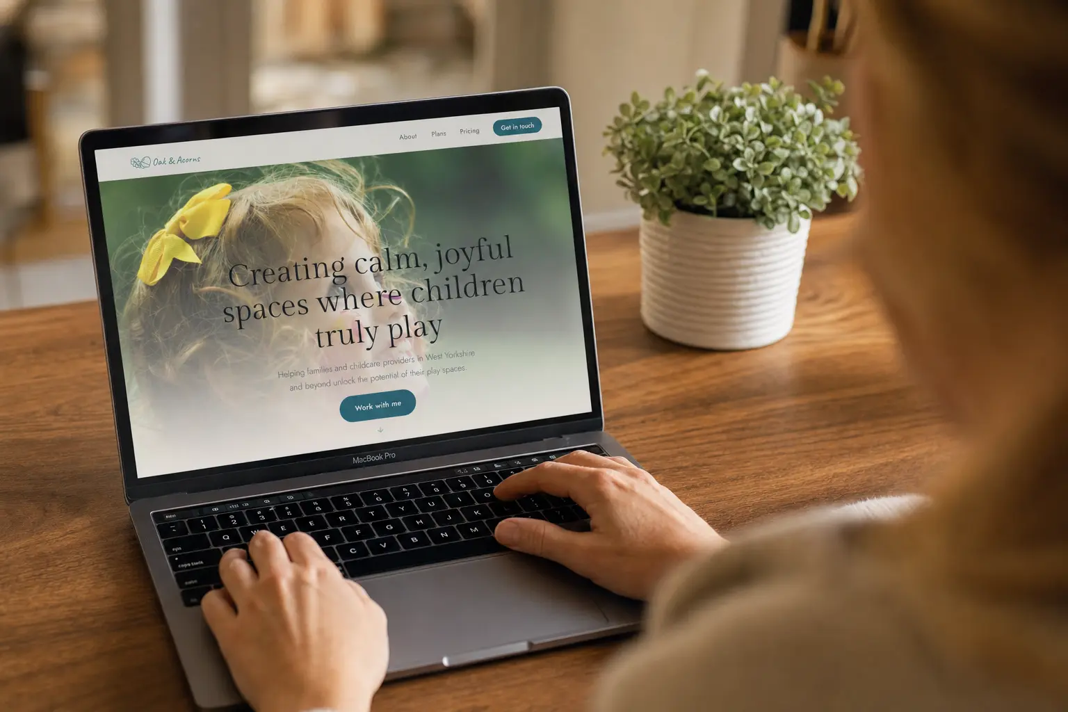 Oak & Acorns website on a laptop